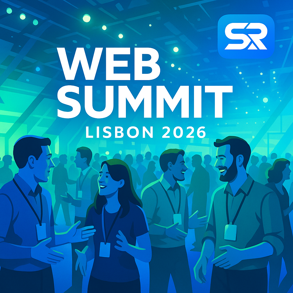 Conference hall at Web Summit Lisbon 2026 with attendees networking.